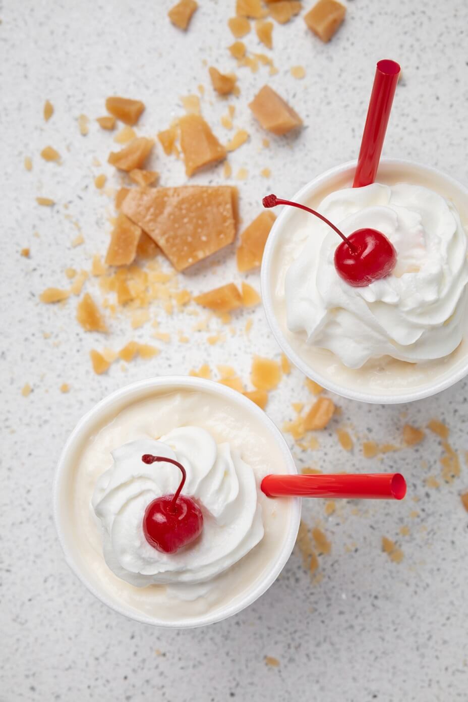 butterscotch crumble milkshake with whipped cream and a cherry
