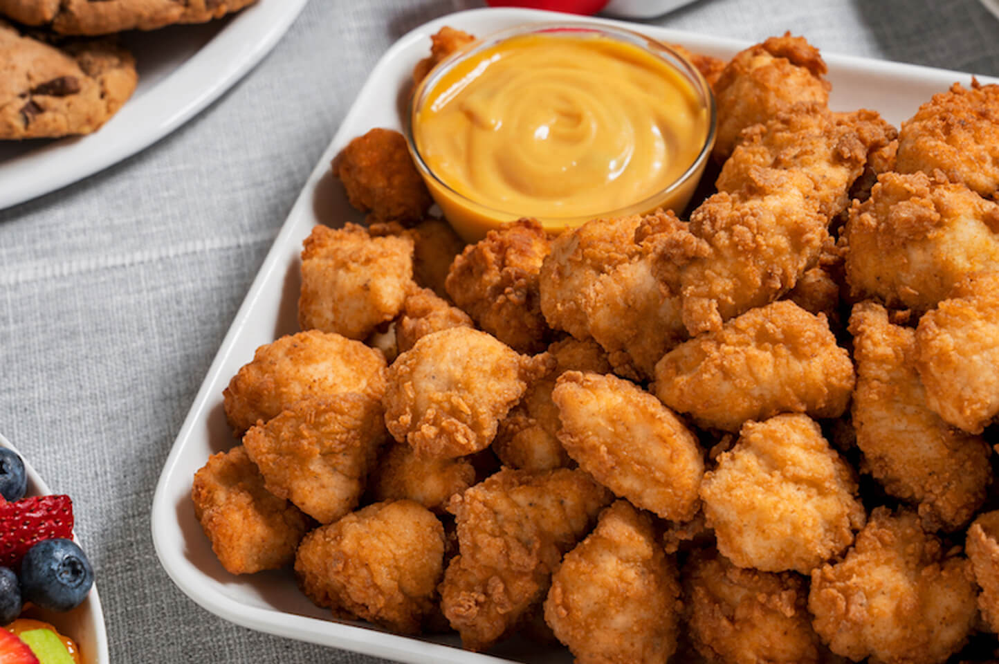 Tray of Chick fil A Nuggets on Table with Chick-fil-A Sauce