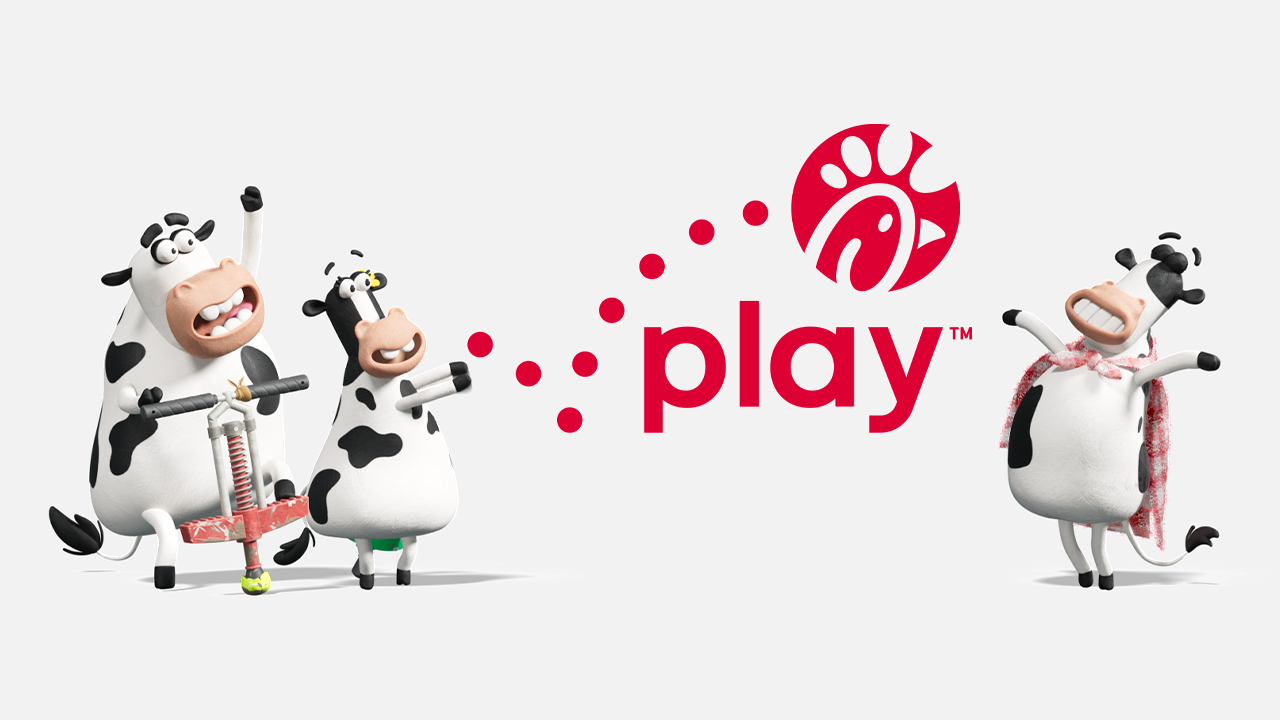 Animated cows standing around the Chick-fil-A Play logo.