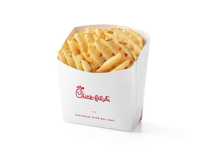 A serving of waffle Fries in a red Chick-fil-A fry container. 