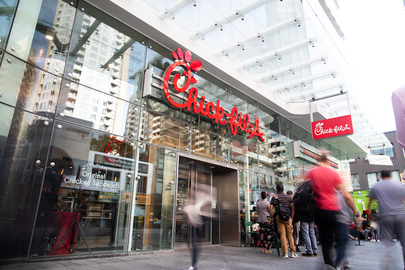 Restaurant photo of Chick-fil-A Yonge & Bloor in Toronto with a lineup on opening day.