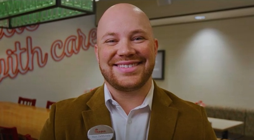 Matt DeMichele-Rigoni, the local Owner-Operator of Chick-fil-A Copley Square smiling at the camera.