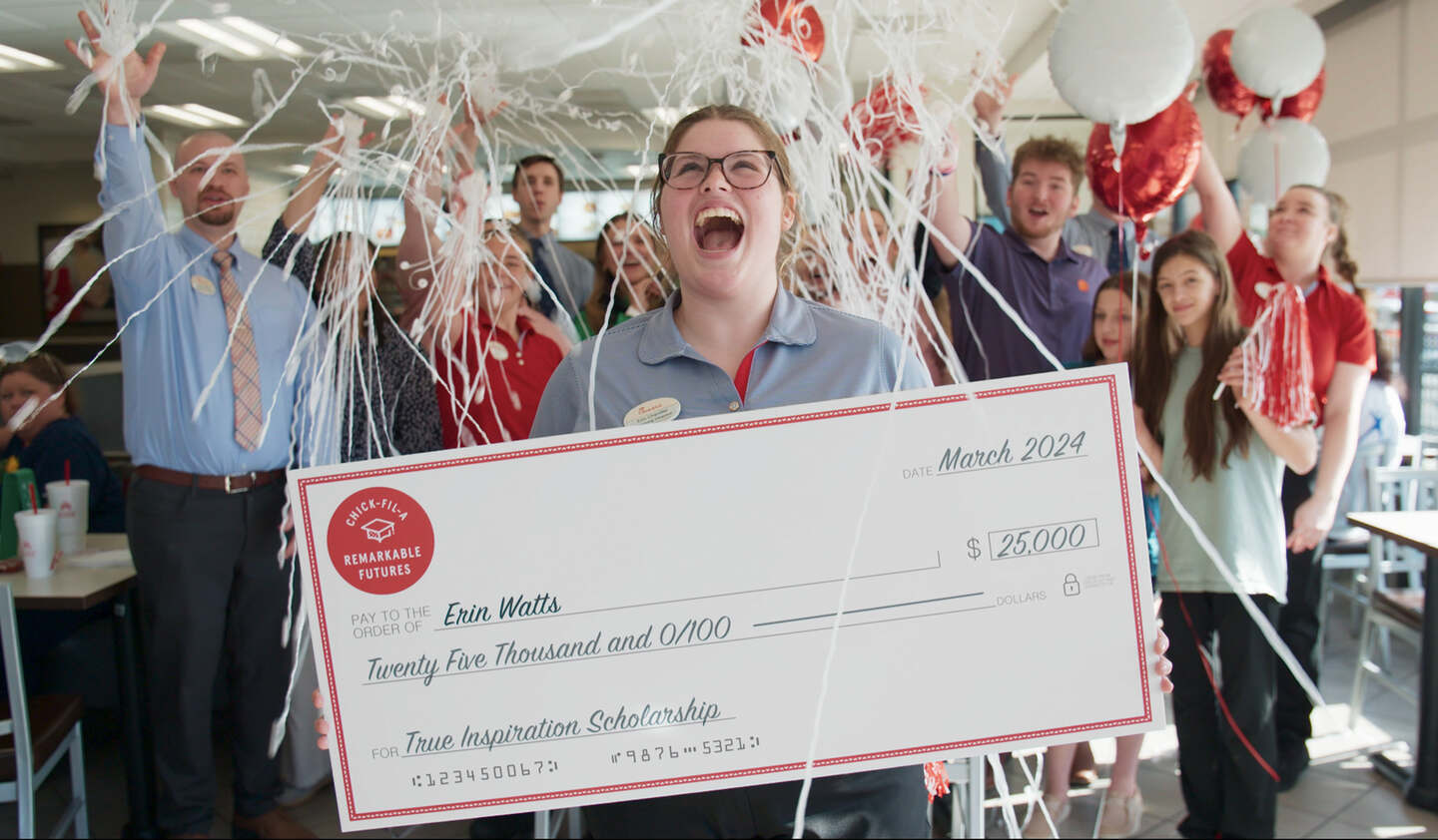 Chick-fil-A Team Member Erin Watts celebrating being awarded a 2024 True Inspiration Scholarship.