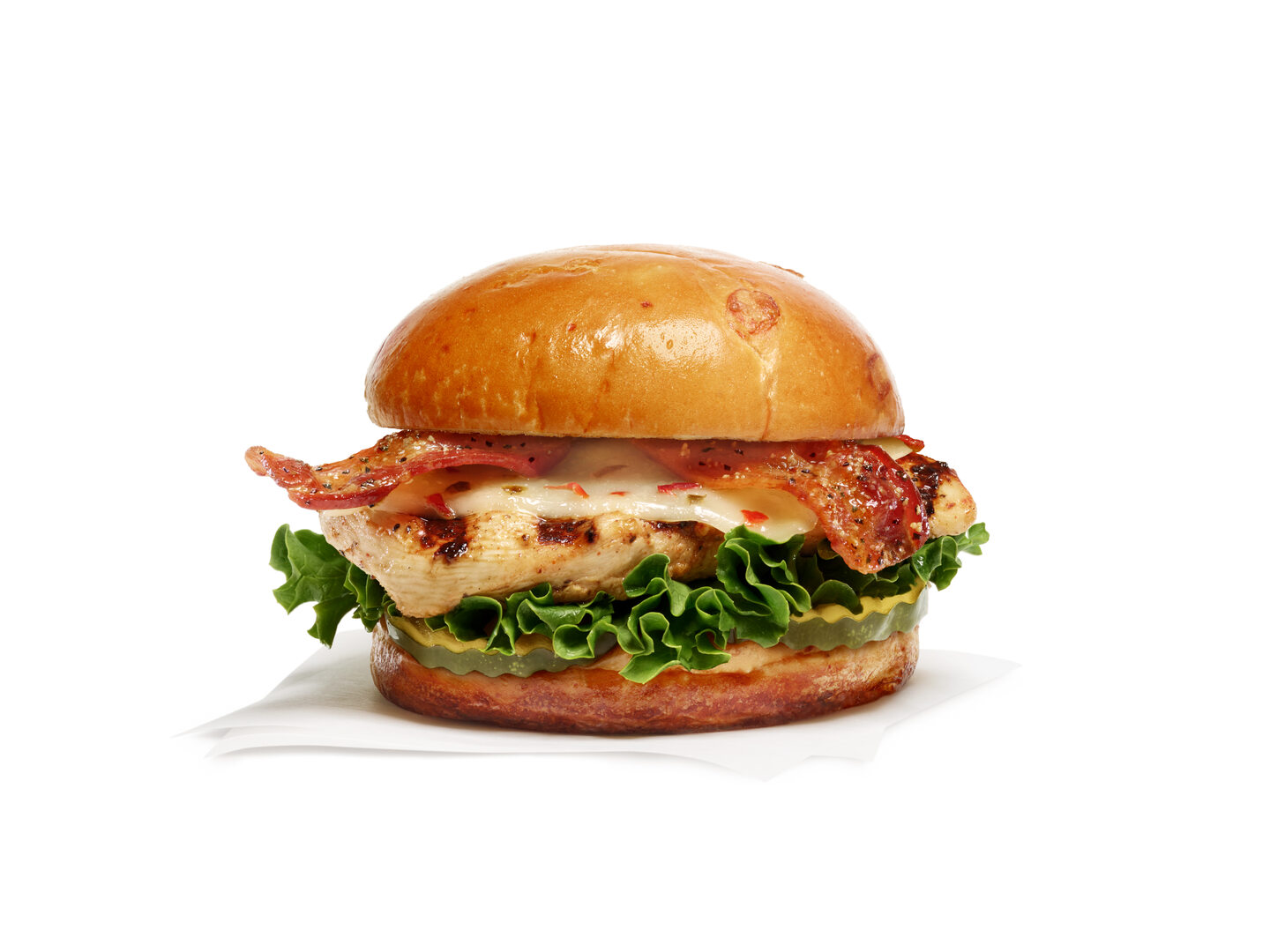 The new Chick-fil-A Maple Pepper Bacon Sandwich on a plain white background.