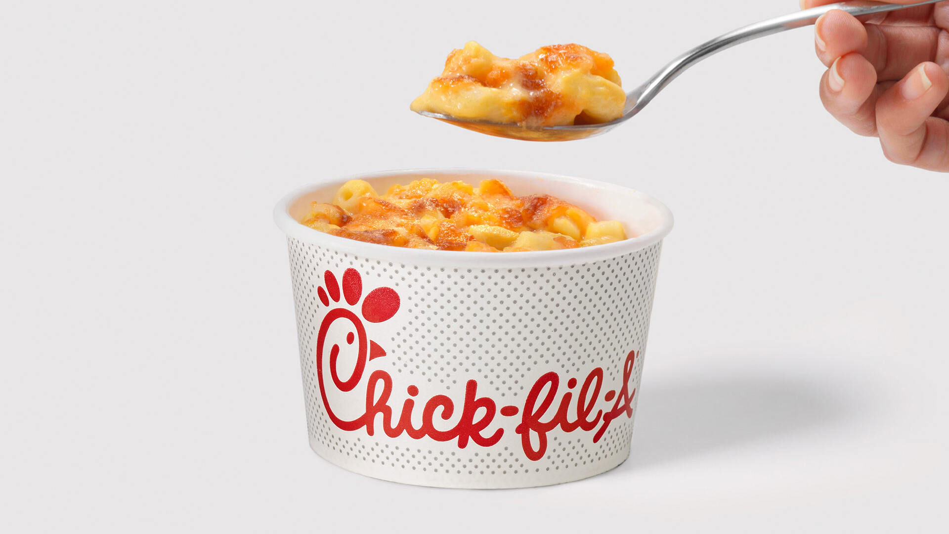 Chick-fil-A Mac & Cheese in a cup on a white background.