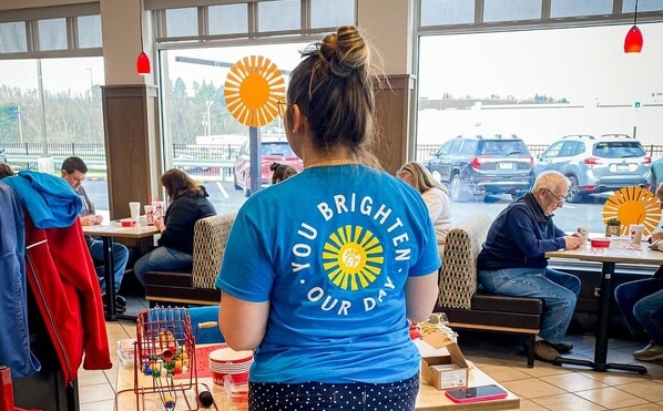 Team Member in Sunshine Days shirt last year.