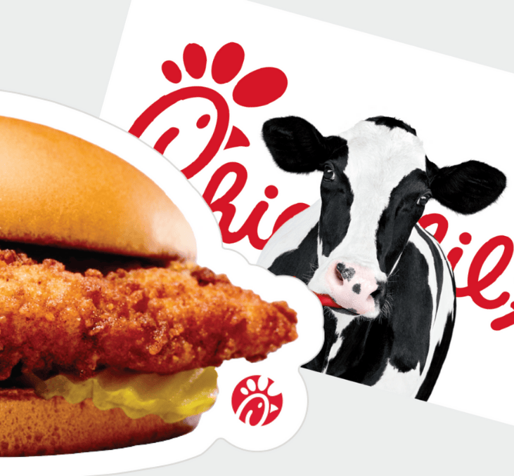 Chick-fil-A® Chicken Sandwich die-cut gift card laying over Chick-fil-A® cow gift card