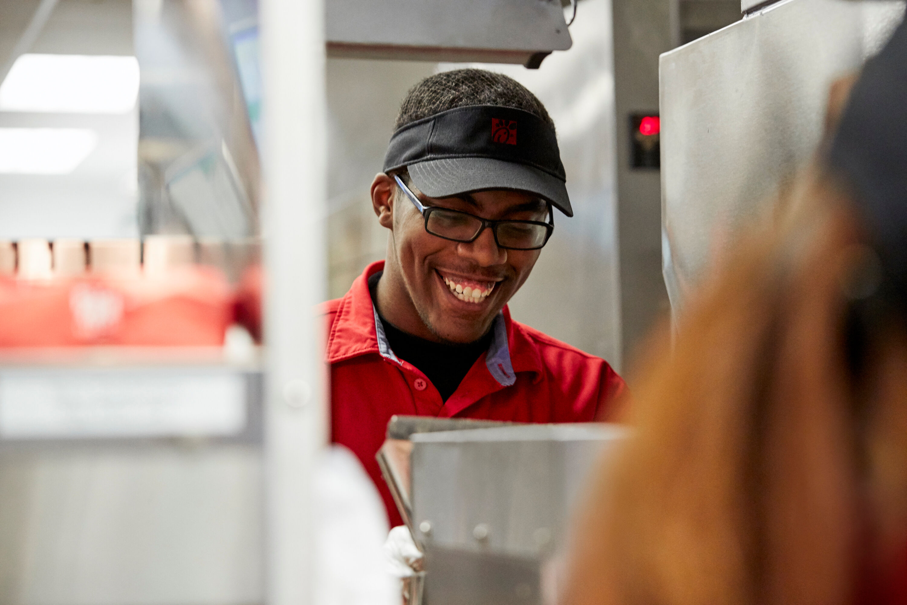 A smiling Team Member working