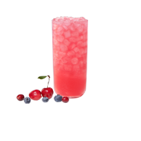 A glass of Cherry Berry Lemonade on a white background with cherries, blueberries and cranberries  