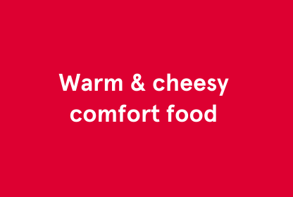 A red box with white text that says "Warm & cheesy comfort food"