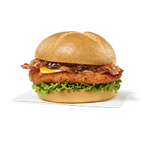 Smokehouse BBQ Bacon Sandwich with Spicy filet sitting on a napkin on a white background
