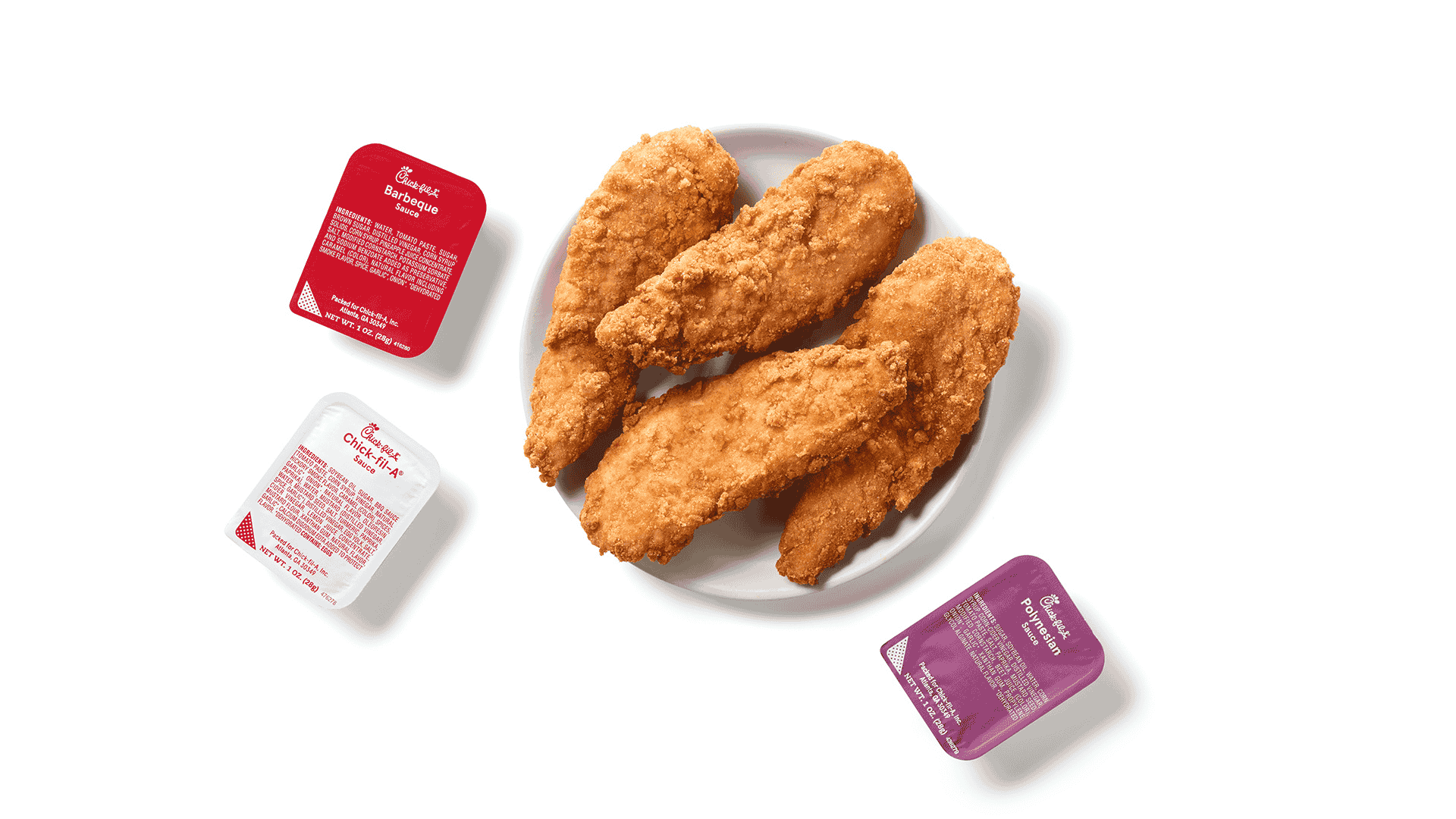 A white plate of 4-count Chick-fil-A Chick-n-Strips® with a packet of Barbeque Sauce, Chick-fil-A® Sauce and Polynesian Sauce next to it.