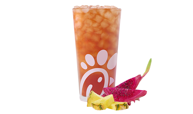 A glass of a Pineapple Dragonfruit Iced Tea on a white background