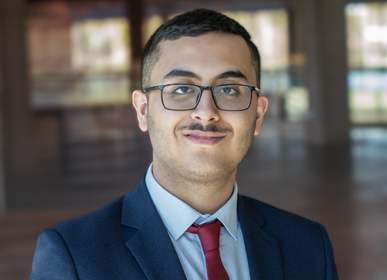 Headshot of Hasan