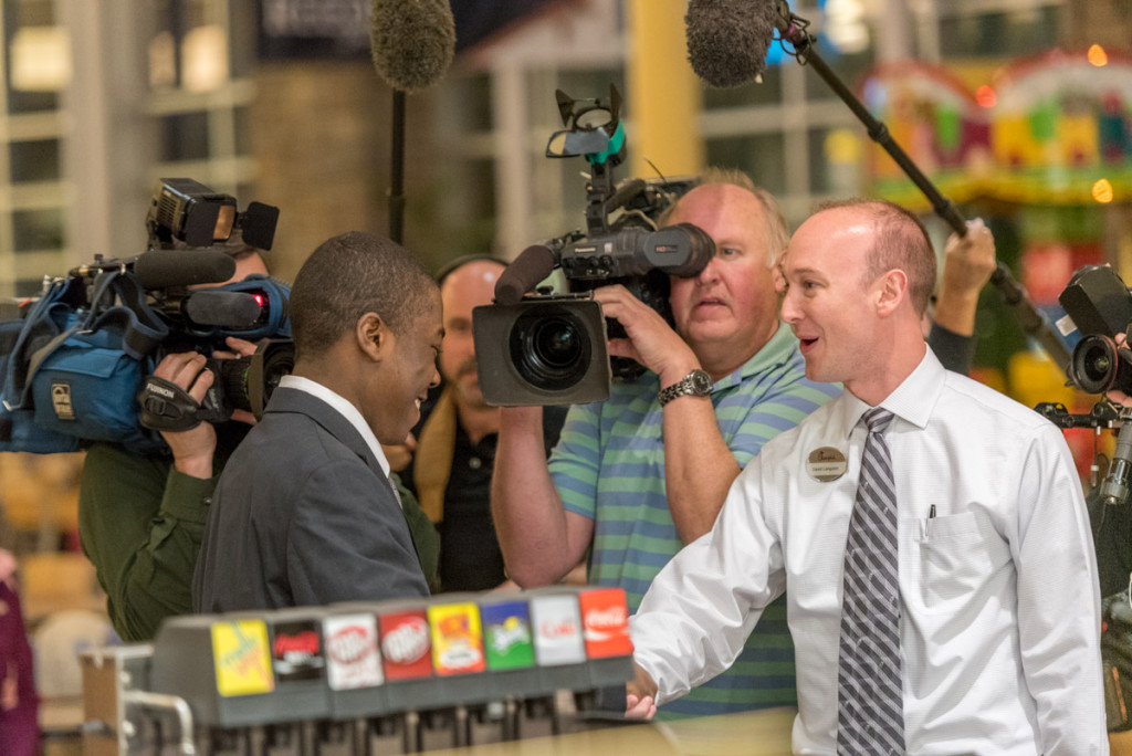 David Langston and Yasir Moore hand shake