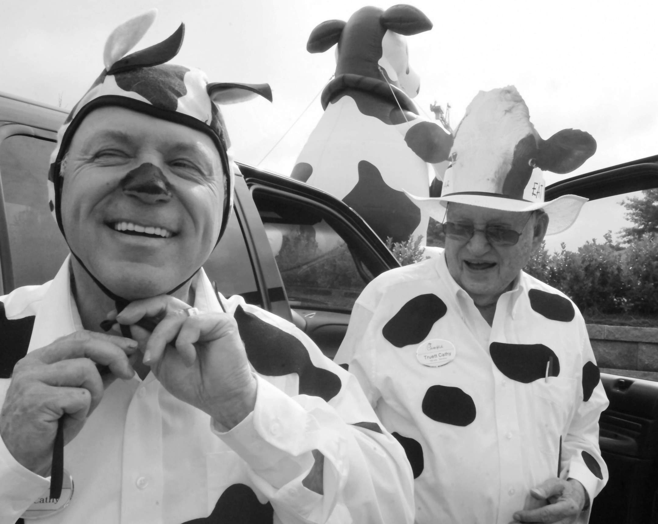 Truett and Dan dressed as cows