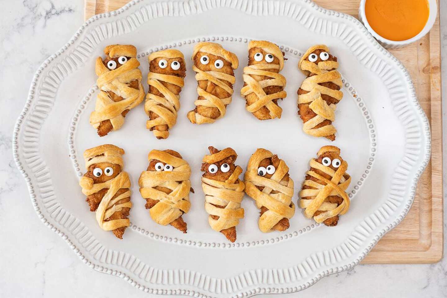 Chick-fil-A Chick-n-Strips Tray made into mummies using pre-made dough
