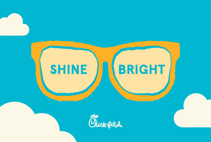 Blue graphic with yellow sunglasses and “Shine bright”